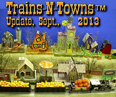 The official e-newsletter of Big Indoor Trains<sup><small>TM</small></sup> and Big Christmas Trains<sup><small>TM</small></sup>.  This photo shows some of Howard Lamey's Spook Hill structures arranged for display.  Click for bigger picture.
